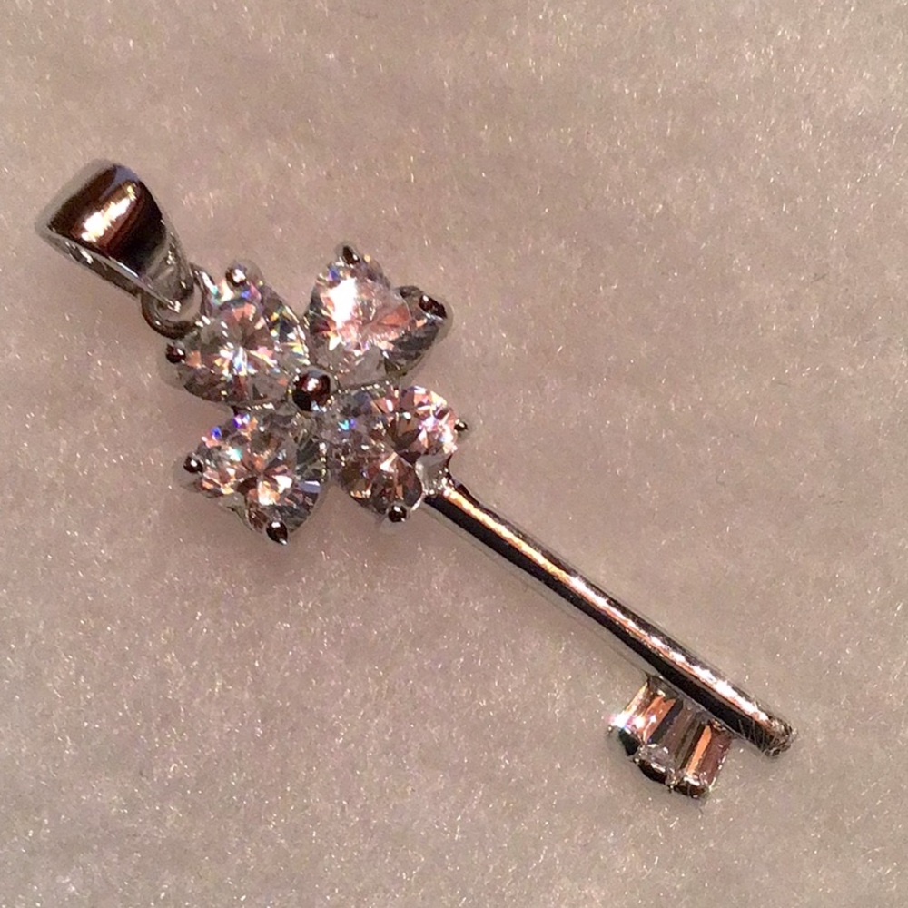 New Fashion Heart Key Pendant. Sparkling Heart Shaped CZ stones.